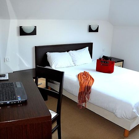 Hotel Les Bénédictins Limoges Habitación foto